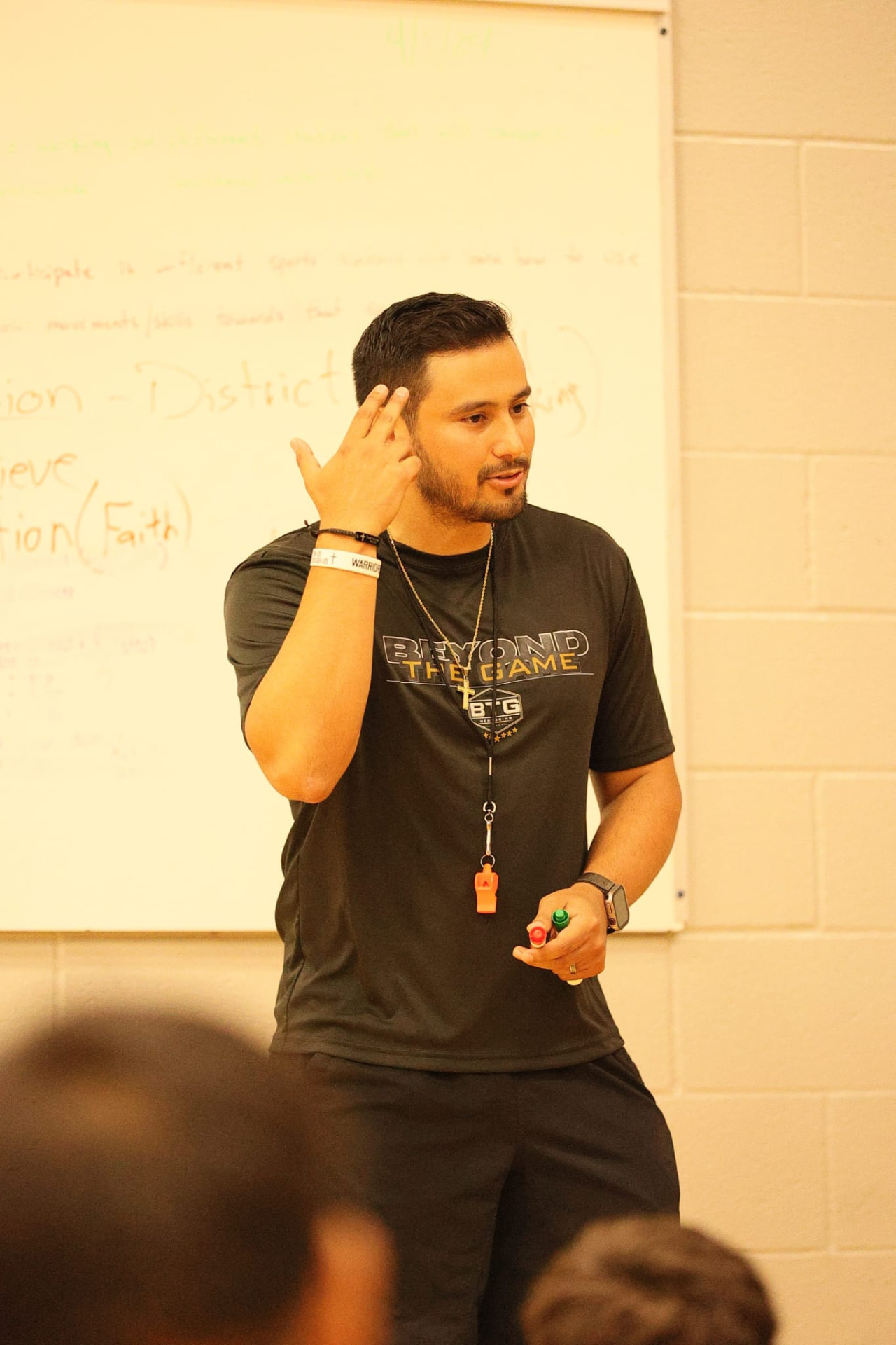 Daniel Rosas teaching students in a classroom